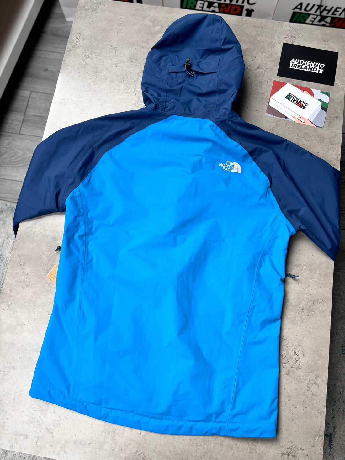 THE NORTH FACE RAIN JACKET - BLUE/ORANGE