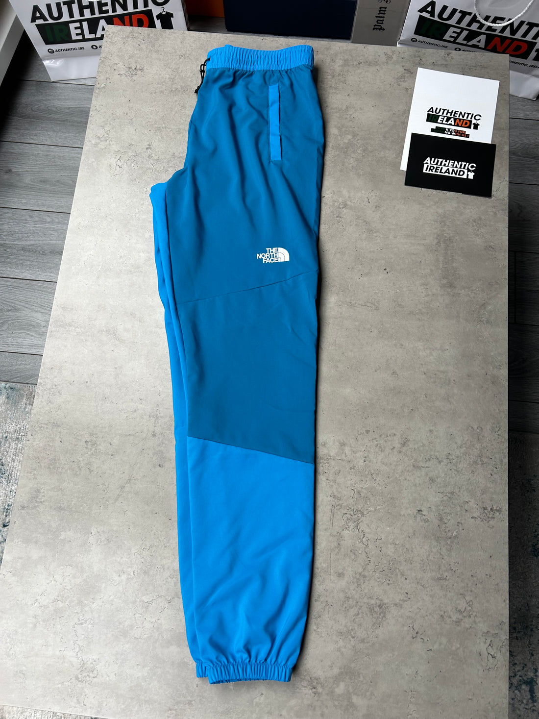 THE NORTH FACE TWO-TONE WOVEN TRACKSUIT - BLUE/BLACK