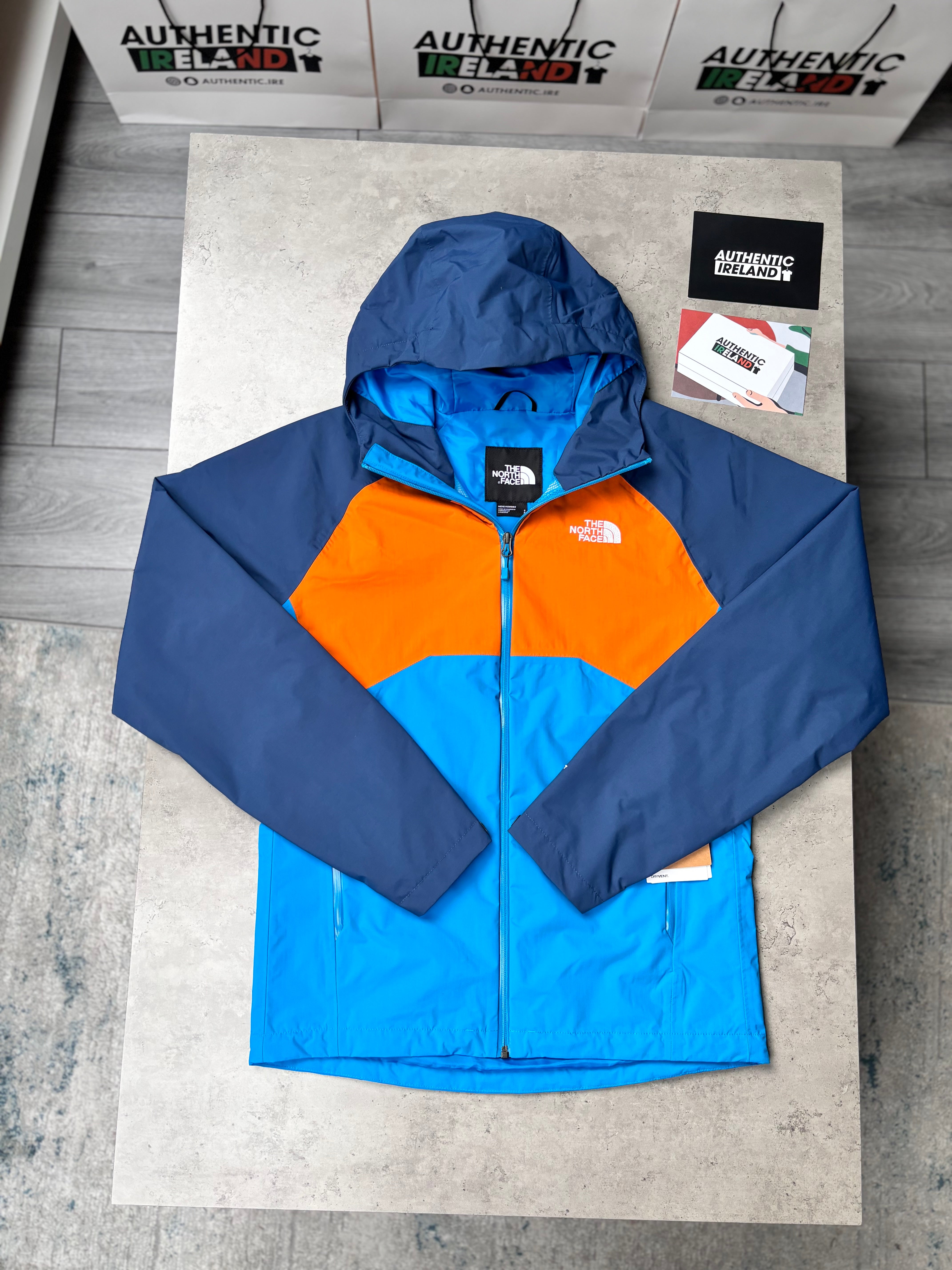 THE NORTH FACE RAIN JACKET BLUE ORANGE