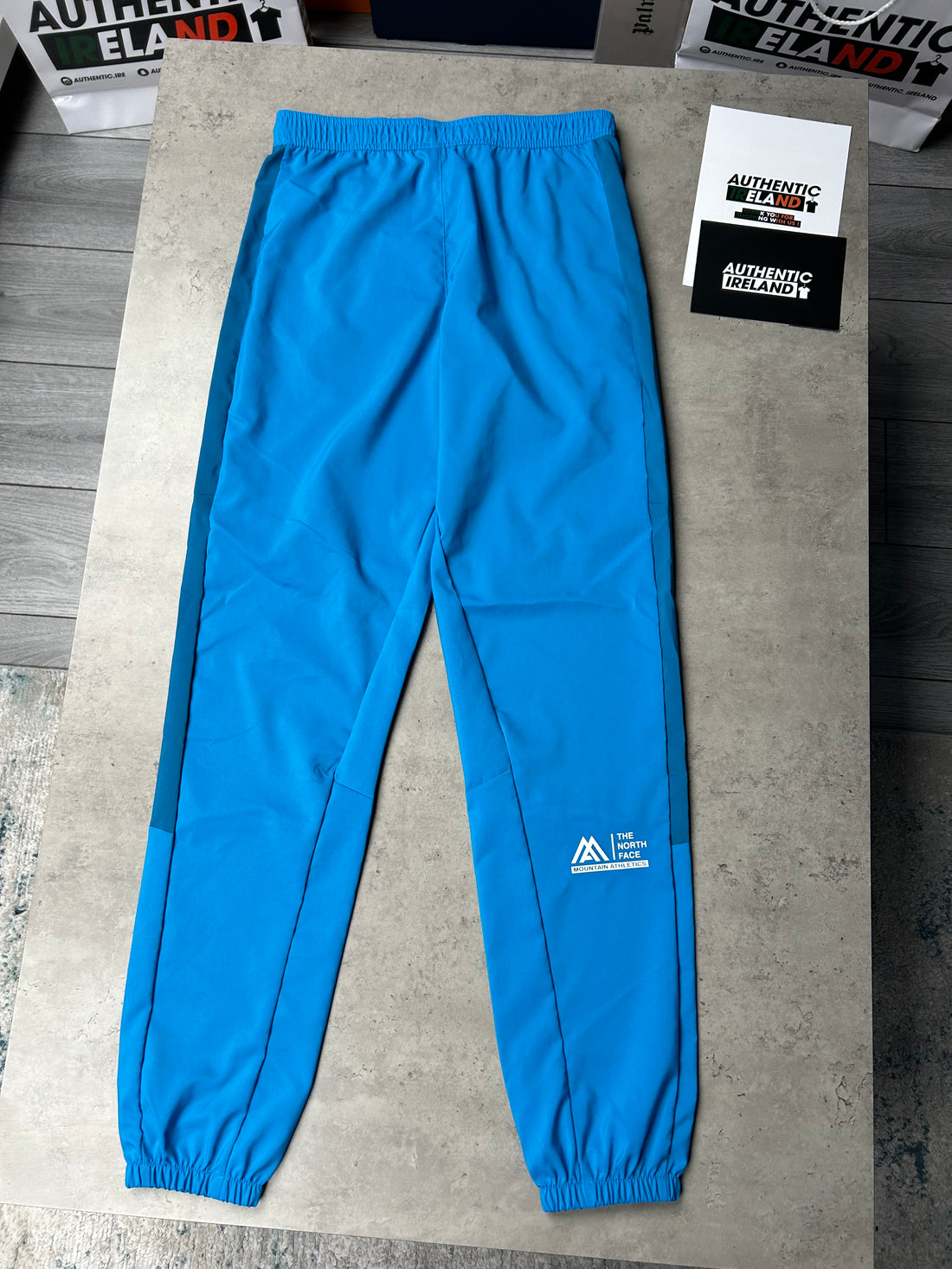 THE NORTH FACE TWO-TONE WOVEN TRACKSUIT - BLUE/BLACK