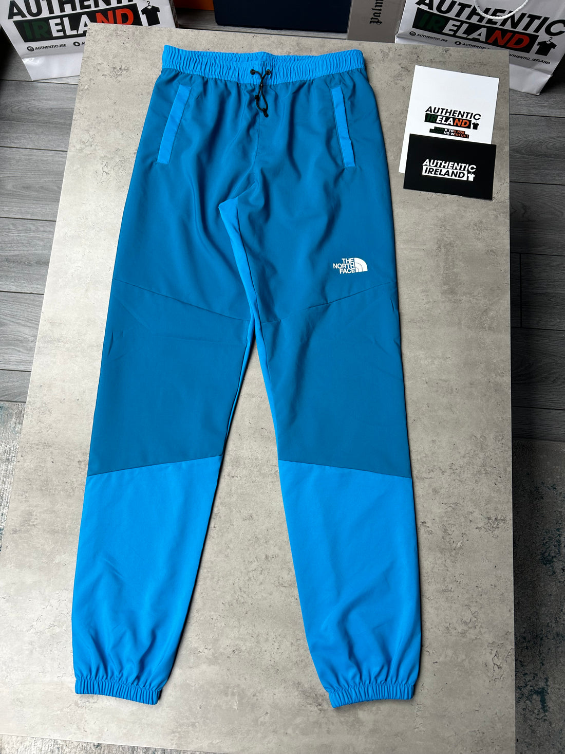 THE NORTH FACE TWO-TONE WOVEN TRACKSUIT - BLUE/BLACK