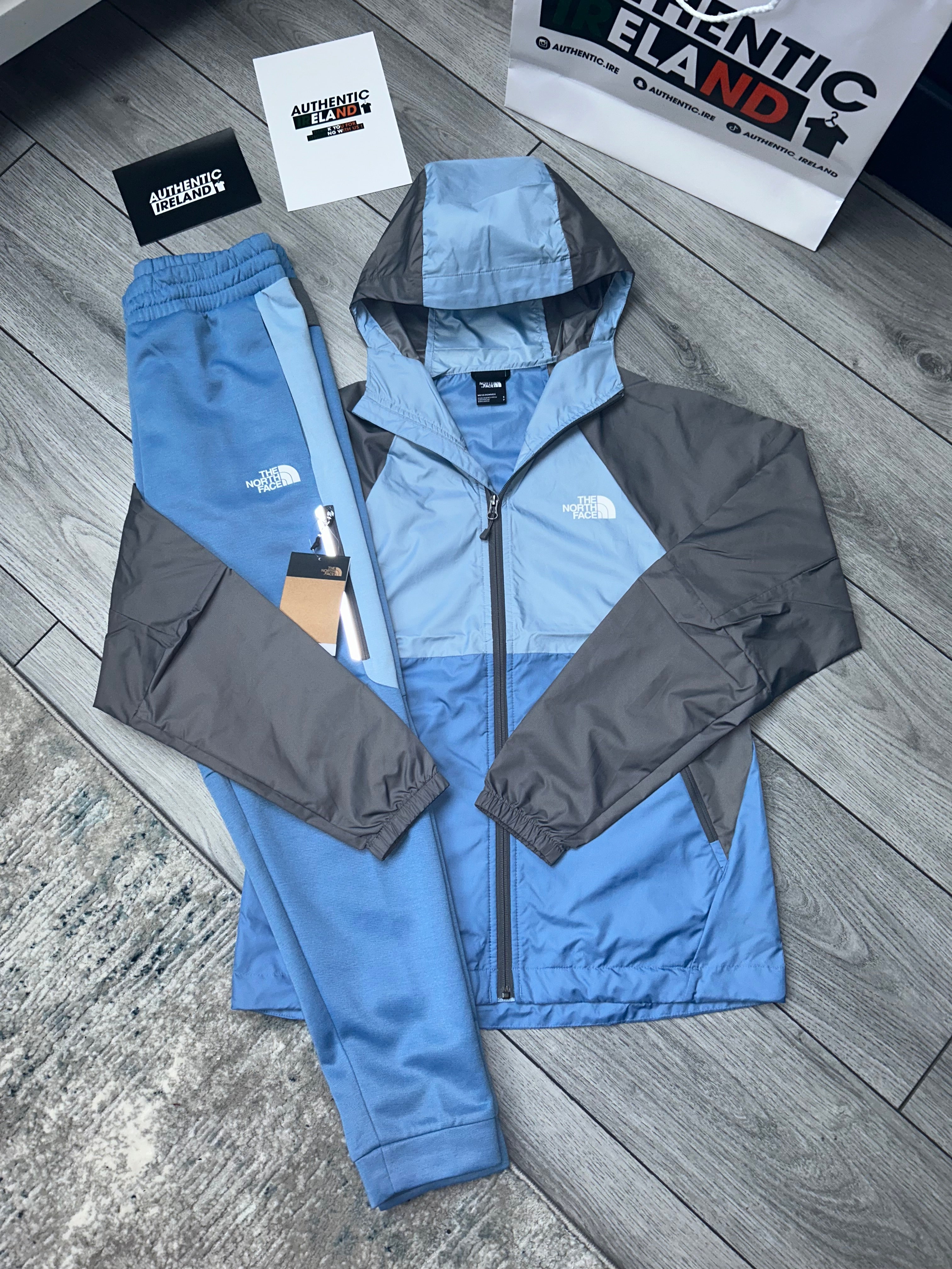 Blue and grey north face tracksuit best sale