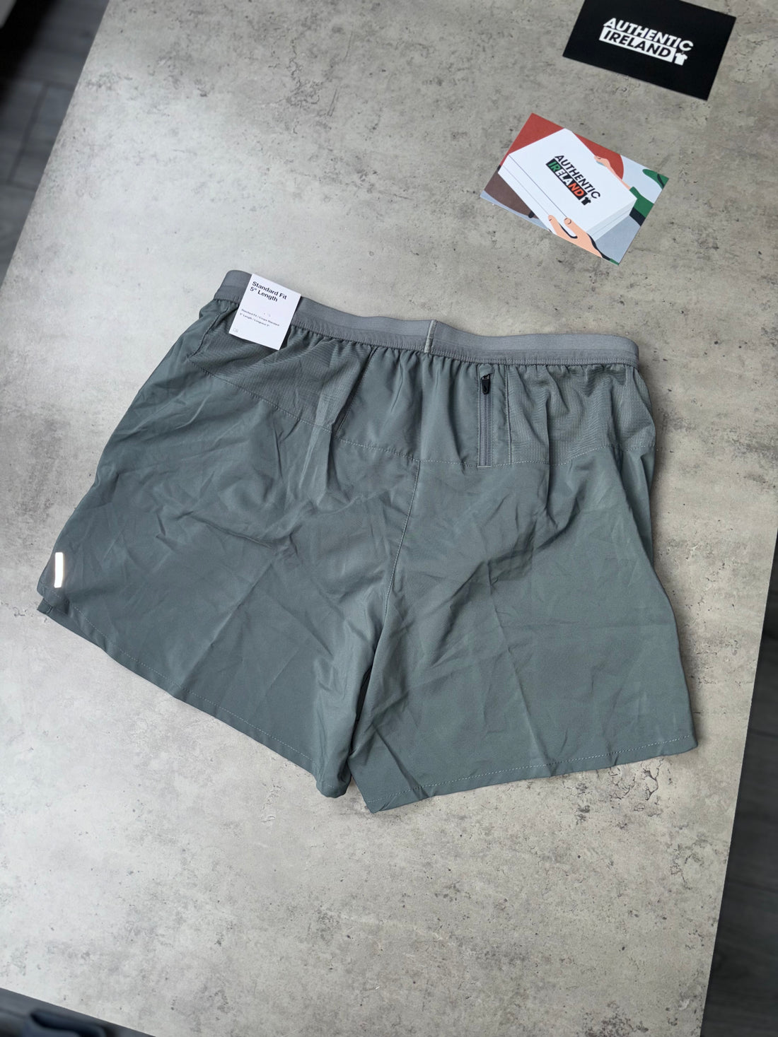 NIKE FLEX STRIDE SHORT - GREY