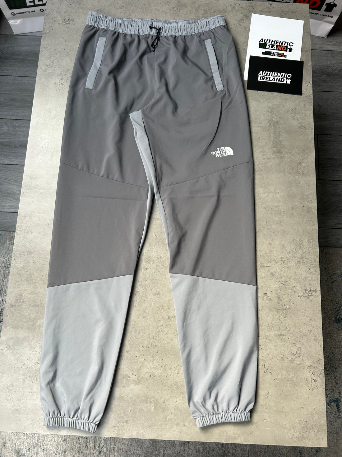THE NORTH FACE TWO-TONE WOVEN TRACKSUIT - GREY