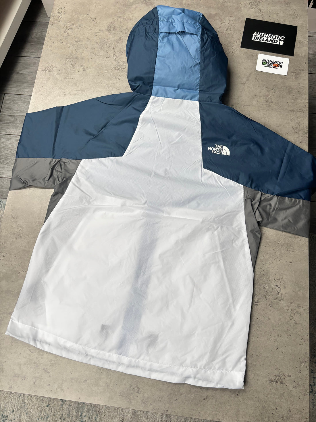 THE NORTH FACE WINDBREAKER JACKET - BLUE/NAVY/GREY/WHITE