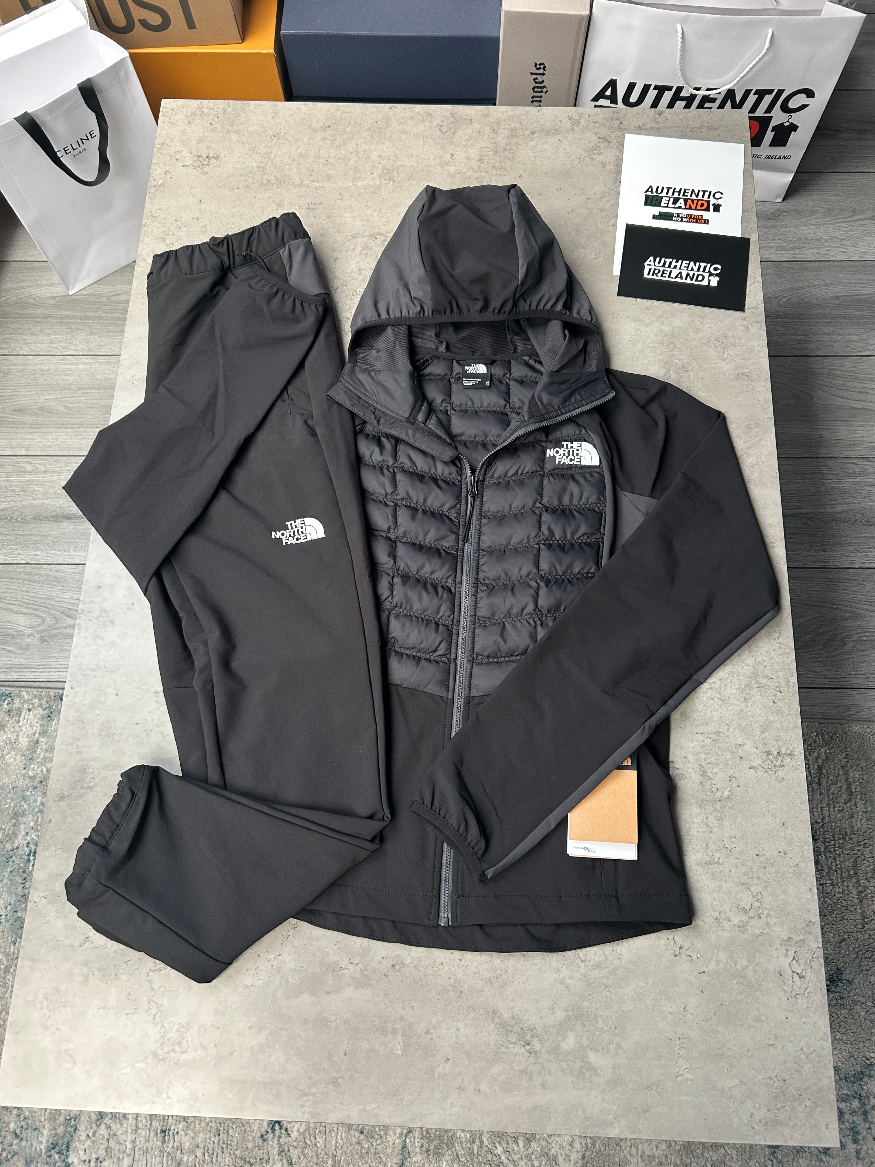 Black north face tracksuit online